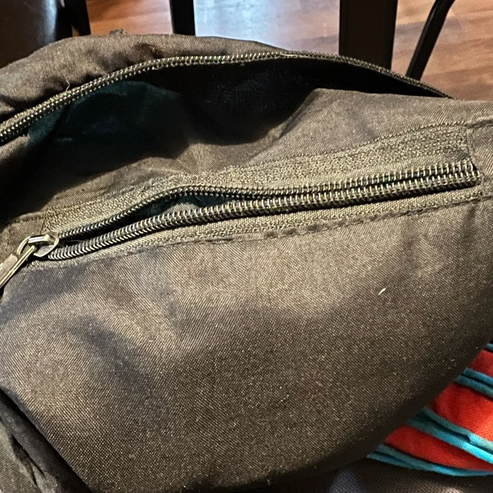 Rising International Americana Eagle bag with button and zip closure crossbody.